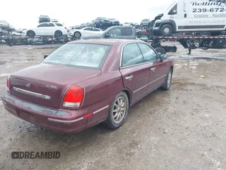 2003 Hyundai XG with VIN KMHFU45E43A257473, listed as a IAAI auction lot 41385881 with 184,165 mi miles. Bid and sale history available at carsss.com. Image 4.
