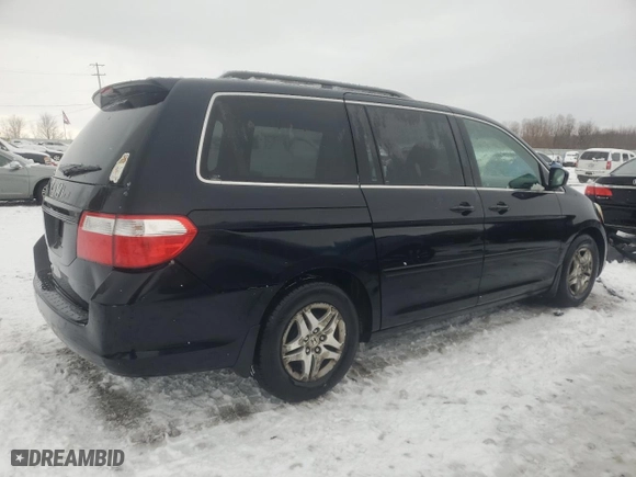2007 Honda Odyssey EX-L with VIN 5FNRL38787B046687, listed as a Copart auction lot 87215294 with 228,260 mi miles and Salvage Title. Bid and sale history available at carsss.com. Image 3.