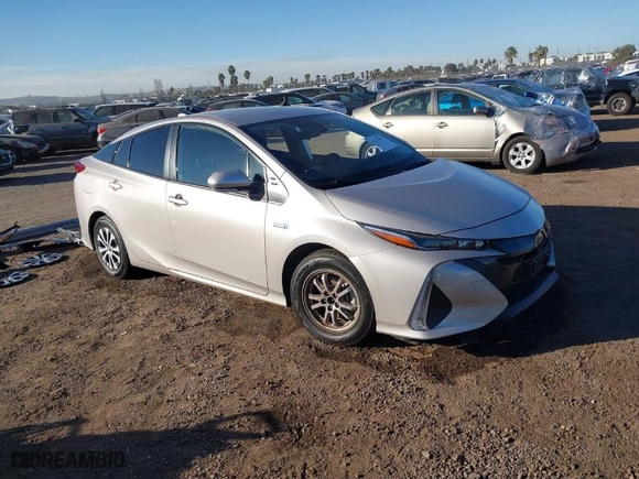 2021 Toyota Prius Prime LE with VIN JTDKAMFP1M3178179, listed as a IAAI auction lot 41233411 with 83,035 mi miles. Bid and sale history available at carsss.com. Image 1.