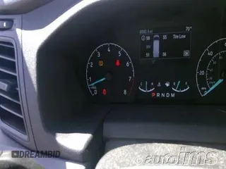 2023 Ford Transit Cargo z VIN 1FTBR1X80PKC02609, wystawiony jako IAAI lot #42845487 z przebiegiem 6 879 mil mil oraz . Historia ofert i sprzedaży dostępna na DreamBid. Obrazek 7.