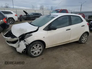 2012 Mazda 2 Sport with VIN JM1DE1KY8C0145089, listed as a Copart auction lot 52093925 with 211,282 mi miles and Salvage Title. Bid and sale history available at DreamBid. Image 1.