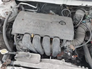 2004 Toyota Corolla CE with VIN 1NXBR32E34Z335238, listed as a IAAI auction lot 41987476 with 124,999 mi miles. Bid and sale history available at carsss.com. Image 10.