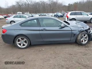 2014 BMW 4 Series 428i xDrive with VIN WBA3N9C50EK246002, listed as a IAAI auction lot 41612256 with 100,915 mi miles and . Bid and sale history available at carsss.com. Image 13.