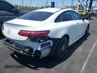 2022 Mercedes-Benz E 450 with VIN W1K1J5JB9NF173816, listed as a IAAI auction lot 42394337 with 34,251 mi miles and . Bid and sale history available at DreamBid. Image 4.