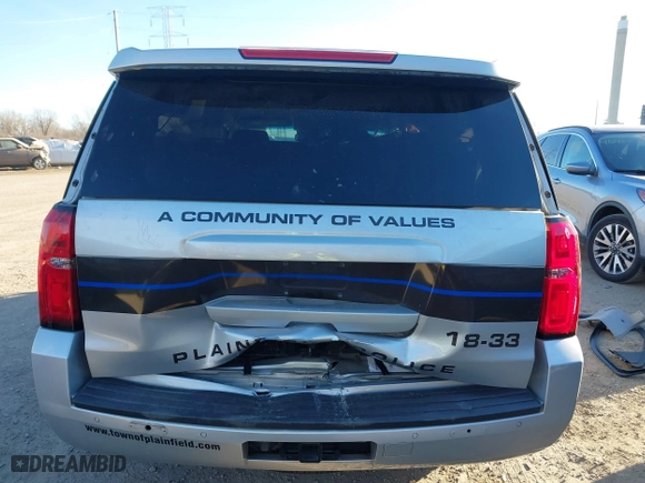 2018 Chevrolet Tahoe Commercial with VIN 1GNSKDEC1JR340887, listed as a IAAI auction lot 41044038 with 99,500 mi miles. Bid and sale history available at carsss.com. Image 20.