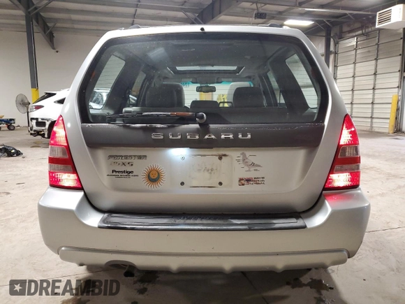 2003 Subaru Forester XS with VIN JF1SG65673H714885, listed as a Copart auction lot 74063684 with 298,649 mi miles and Salvage Title. Bid and sale history available at carsss.com. Image 6.