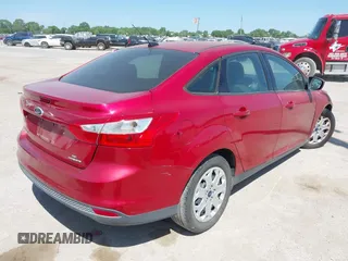 2012 Ford Focus SE z VIN 1FAHP3F21CL428659, wystawiony jako IAAI lot #42040183 z przebiegiem 195 947 mil mil oraz . Historia ofert i sprzedaży dostępna na DreamBid. Obrazek 4.