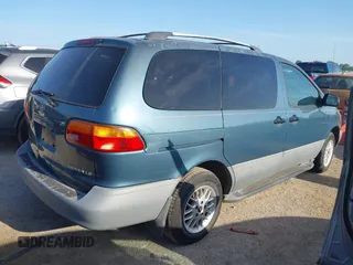2000 Toyota Sienna LE with VIN 4T3ZF13C2YU204601, listed as a IAAI auction lot 42679413 with 253,235 mi miles and . Bid and sale history available at DreamBid. Image 4.