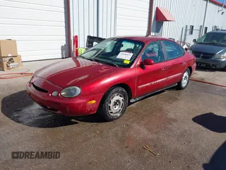 1997 Ford Taurus GL z VIN 1FALP52U2VA207986, wystawiony jako IAAI lot #41606014 z przebiegiem 225 124 mil mil oraz . Historia ofert i sprzedaży dostępna na DreamBid. Obrazek 2.