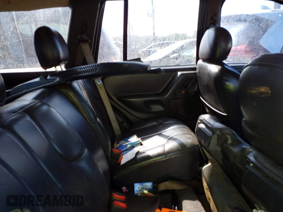 1999 Jeep Grand Cherokee Laredo with VIN 1J4GW58S0XC678864, listed as a IAAI auction lot 37593033 with Not provided miles and . Bid and sale history available at DreamBid. Image 8.