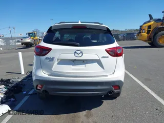 2016 Mazda CX-5 Grand Touring with VIN JM3KE4DY9G0706192, listed as a IAAI auction lot 41824828 with Not Provided miles and . Bid and sale history available at DreamBid. Image 16.