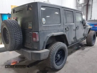 2018 Jeep Wrangler JK Unlimited Sport with VIN 1C4BJWDG0JL867687, listed as a IAAI auction lot 41426838 with 78,116 mi miles. Bid and sale history available at carsss.com. Image 4.