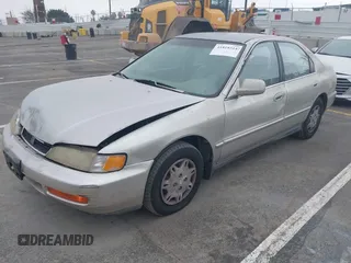 1997 Honda Accord Value with VIN 1HGCD568XVA184006, listed as a IAAI auction lot 41818518 with 276,230 mi miles and . Bid and sale history available at carsss.com. Image 17.