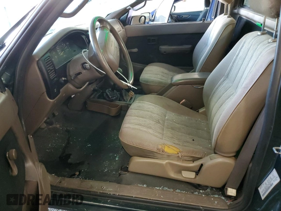 1999 Toyota Tacoma with VIN 4TAPM62N9XZ555738, listed as a Copart auction lot 78293634 with 210,096 mi miles and Salvage Title. Bid and sale history available at DreamBid. Image 7.