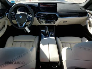 2023 BMW 5 Series 540i xDrive with VIN WBA73BJ03PCM49114, listed as a Copart auction lot 80693214 with 5,251 mi miles and Salvage Title. Bid and sale history available at carsss.com. Image 8.