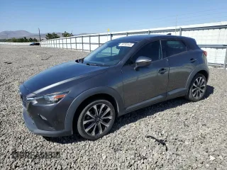 2019 Mazda CX-3 Touring z VIN JM1DKFC72K0430266, wystawiony jako Copart lot #59765545 z przebiegiem 77 534 mil mil oraz Szkoda całkowita • Salvage title. Historia ofert i sprzedaży dostępna na DreamBid. Obrazek 1.