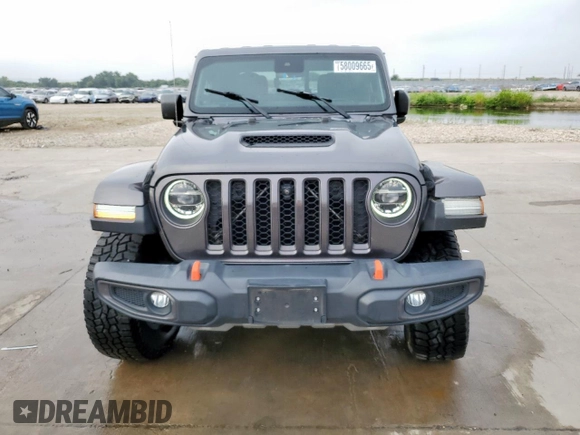 2020 Jeep Gladiator Mojave z VIN 1C6JJTEG8LL207481, wystawiony jako Copart lot #58009665 z przebiegiem 57 479 mil mil oraz Szkoda całkowita • Salvage title. Historia ofert i sprzedaży dostępna na DreamBid. Obrazek 5.