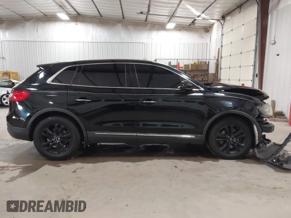 2016 Lincoln MKX Premiere with VIN 2LMTJ6JR4GBL75053, listed as a IAAI auction lot 41020450 with 120,930 mi miles. Bid and sale history available at carsss.com. Image 13.