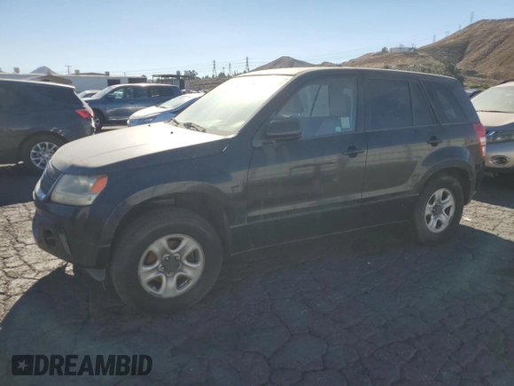 2009 Suzuki Grand Vitara z VIN JS3TD042294100363, wystawiony jako Copart lot #88151185 z przebiegiem 86 595 mil mil oraz Czysty tytuł • Clean title. Historia ofert i sprzedaży dostępna na DreamBid. Obrazek 1.