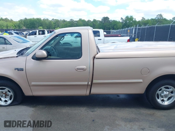 1997 Ford F-150 with VIN 1FTDF17W9VNA84250, listed as a IAAI auction lot 42149320 with 85,297 mi miles and . Bid and sale history available at DreamBid. Image 14.