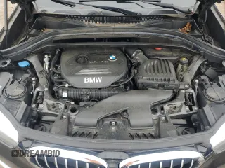 2018 BMW X1 xDrive28i z VIN WBXHT3C30J5L30276, wystawiony jako Copart lot #58903045 z przebiegiem 86 778 mil mil oraz Szkoda całkowita • Salvage title. Historia ofert i sprzedaży dostępna na DreamBid. Obrazek 12.