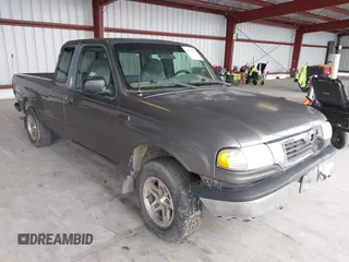 1999 Mazda B-Series Truck SE z VIN 4F4YR16C8XTM43366, wystawiony jako IAAI lot #41891873 z przebiegiem 235 043 mil mil oraz . Historia ofert i sprzedaży dostępna na DreamBid. Obrazek 1.