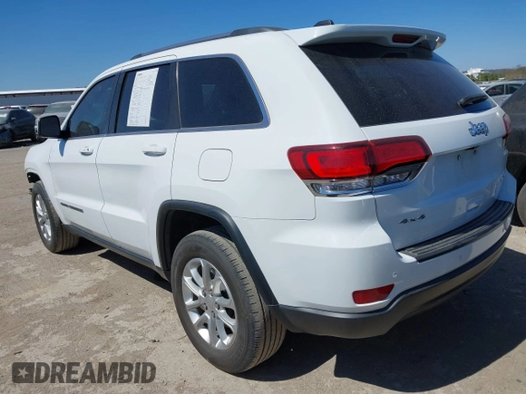 2021 Jeep Grand Cherokee Laredo E with VIN 1C4RJFAG5MC579865, listed as a IAAI auction lot 41818874 with 105,489 mi miles and . Bid and sale history available at DreamBid. Image 3.