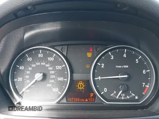 2010 BMW 1 Series 128i with VIN WBAUL7C58AVJ78135, listed as a IAAI auction lot 41615767 with 107,384 mi miles and . Bid and sale history available at DreamBid. Image 7.