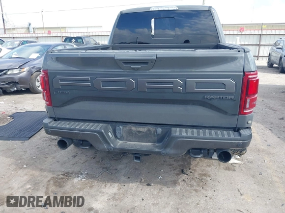 2020 Ford F-150 Raptor with VIN 1FTFW1RG4LFA37620, listed as a IAAI auction lot 41483733 with 61,081 mi miles and . Bid and sale history available at carsss.com. Image 16.