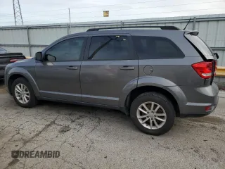2013 Dodge Journey SXT with VIN 3C4PDCBG5DT695888, listed as a Copart auction lot 50302485 with 126,720 mi miles and Salvage Title. Bid and sale history available at DreamBid. Image 2.