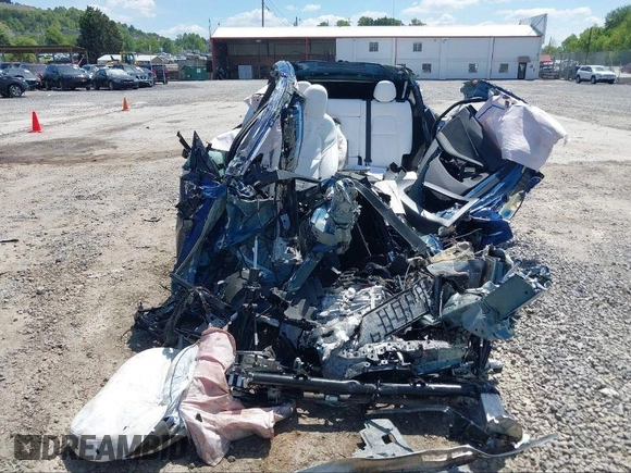 2024 Tesla Model Y Long Range with VIN 7SAYGDEEXRA265159, listed as a IAAI auction lot 40907008 with Not Provided miles and . Bid and sale history available at DreamBid. Image 7.