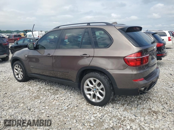 2012 BMW X5 35i with VIN 5UXZV4C51CL748765, listed as a Copart auction lot 62339905 with Not provided miles and Clean title. Bid and sale history available at DreamBid. Image 2.