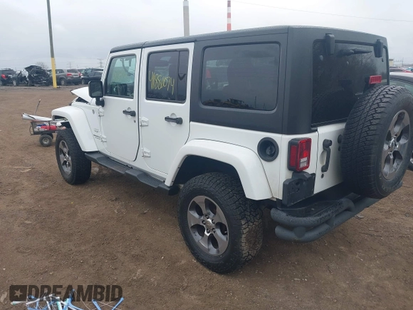 2017 Jeep Wrangler Unlimited 75th Anniversary z VIN 1C4BJWEG9HL684152, wystawiony jako IAAI lot #41880074 z przebiegiem 91 847 mil mil oraz . Historia ofert i sprzedaży dostępna na DreamBid. Obrazek 3.