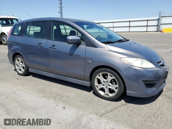 2010 Mazda 5 Sport with VIN JM1CR2WL6A0368572, listed as a Copart auction lot 62604545 with 84,537 mi miles and Salvage title. Bid and sale history available at DreamBid. Image 4.