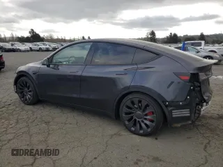 2024 Tesla Model Y Performance with VIN 7SAYGDEF7RF093054, listed as a Copart auction lot 50747985 with 26,907 mi miles and Salvage Title. Bid and sale history available at DreamBid. Image 2.
