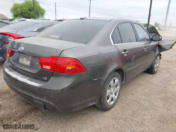 2009 Kia Optima LX with VIN KNAGE228X95299444, listed as a IAAI auction lot 41953241 with 201,170 mi miles. Bid and sale history available at carsss.com. Image 4.