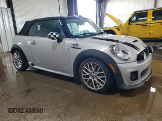 2013 MINI Convertible S z VIN WMWZP3C50DT550943, wystawiony jako Copart lot #62070255 z przebiegiem 63 122 mil mil oraz Szkoda całkowita • Salvage title. Historia ofert i sprzedaży dostępna na DreamBid. Obrazek 4.