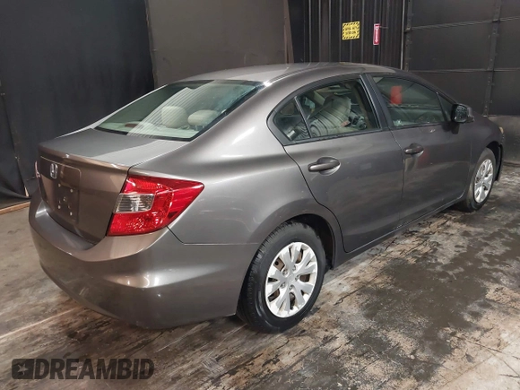 2012 Honda Civic LX z VIN 19XFB2F59CE373830, wystawiony jako IAAI lot #42312118 z przebiegiem 106 541 mil mil oraz . Historia ofert i sprzedaży dostępna na DreamBid. Obrazek 4.