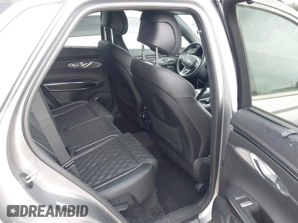 2023 Genesis GV70 Sport with VIN KMUMCDTC1PU098851, listed as a IAAI auction lot 41864774 with 15,016 mi miles and . Bid and sale history available at DreamBid. Image 8.