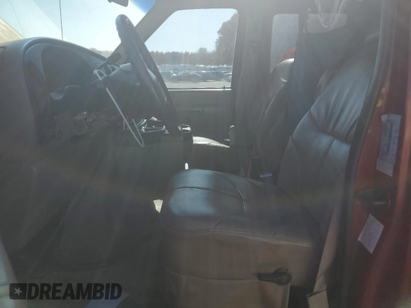 1999 Ford Econoline Cargo with VIN 1FDRE14W1XHB36383, listed as a Copart auction lot 77230084 with 222,420 mi miles and Salvage Title. Bid and sale history available at carsss.com. Image 7.