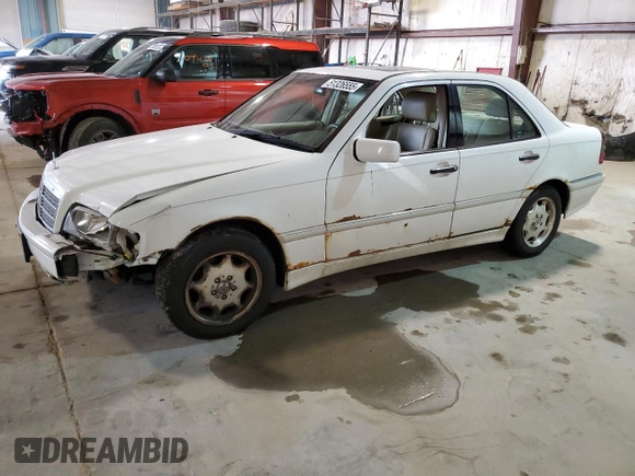 1999 Mercedes-Benz C 230/260/280/320 with VIN WDBHA24G5XA716110, listed as a Copart auction lot 51326555 with 107,190 mi miles and Salvage Title. Bid and sale history available at DreamBid. Image 1.