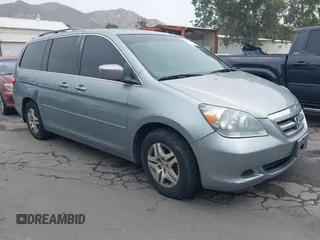 2005 Honda Odyssey EX-L with VIN 5FNRL38625B122635, listed as a IAAI auction lot 42450493 with 169,588 mi miles and . Bid and sale history available at DreamBid. Image 1.