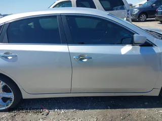 2014 Nissan Altima SL with VIN 1N4AL3AP7EN373903, listed as a IAAI auction lot 41877079 with 211,894 mi miles and . Bid and sale history available at DreamBid. Image 14.