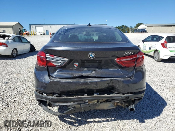 2016 BMW X6 sDrive35i with VIN 5UXKU0C5XG0F92975, listed as a Copart auction lot 74890804 with 64,231 mi miles and Salvage Title. Bid and sale history available at carsss.com. Image 6.