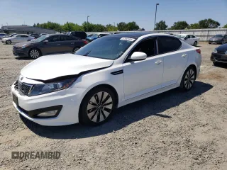2012 Kia Optima SX z VIN 5XXGR4A61CG007878, wystawiony jako Copart lot #57992585 z przebiegiem 147 413 mil mil oraz Szkoda całkowita • Salvage title. Historia ofert i sprzedaży dostępna na DreamBid. Obrazek 1.
