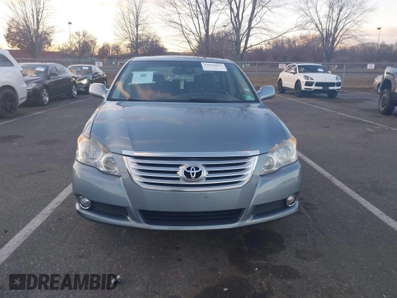2010 Toyota Avalon XL with VIN 4T1BK3DB1AU363817, listed as a IAAI auction lot 41010053 with 259,106 mi miles and . Bid and sale history available at carsss.com. Image 13.
