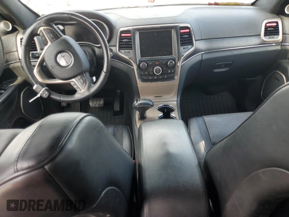 2015 Jeep Grand Cherokee Summit with VIN 1C4RJFJM5FC738473, listed as a Copart auction lot 61049565 with 176,053 mi miles and Clean title. Bid and sale history available at DreamBid. Image 8.