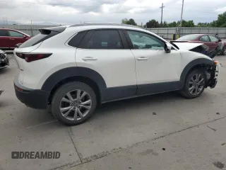 2022 Mazda CX-30 S Select with VIN 3MVDMBBL9NM411859, listed as a Copart auction lot 59875745 with 52,878 mi miles and Salvage title. Bid and sale history available at DreamBid. Image 3.