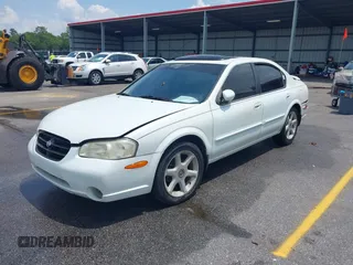 2000 Nissan Maxima GXE z VIN JN1CA31D6YT542083, wystawiony jako IAAI lot #42306685 z przebiegiem 296 613 mil mil oraz . Historia ofert i sprzedaży dostępna na DreamBid. Obrazek 2.