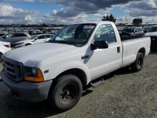 1999 Ford Super Duty F-250 XL with VIN 1FTNF20L0XEE66230, listed as a Copart auction lot 43586355 with 183,821 mi miles and Salvage Title. Bid and sale history available at carsss.com. Image 1.